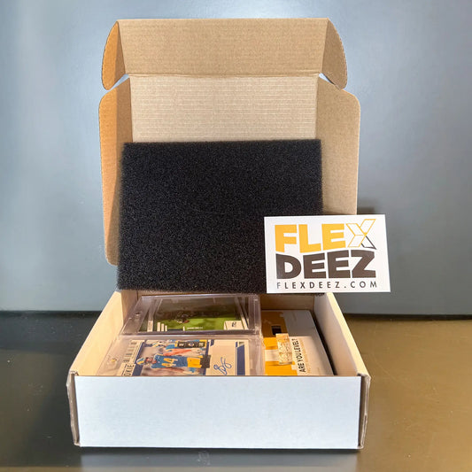 FlexDeez trading card wall display system showing four cards mounted in clear magnetic cases from side angle