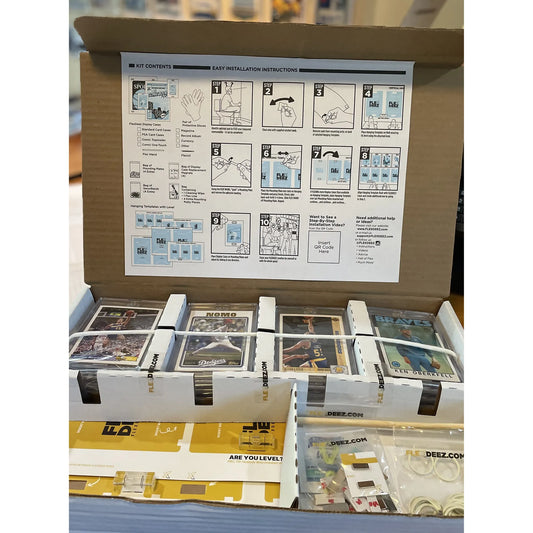 FlexDeez card display kit contents including instruction guide, templates, frames, and tools
