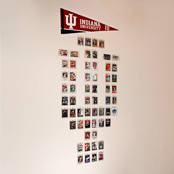 Wall-mounted card display forming an “I” shape beneath Indiana University pennant with FlexDeez system