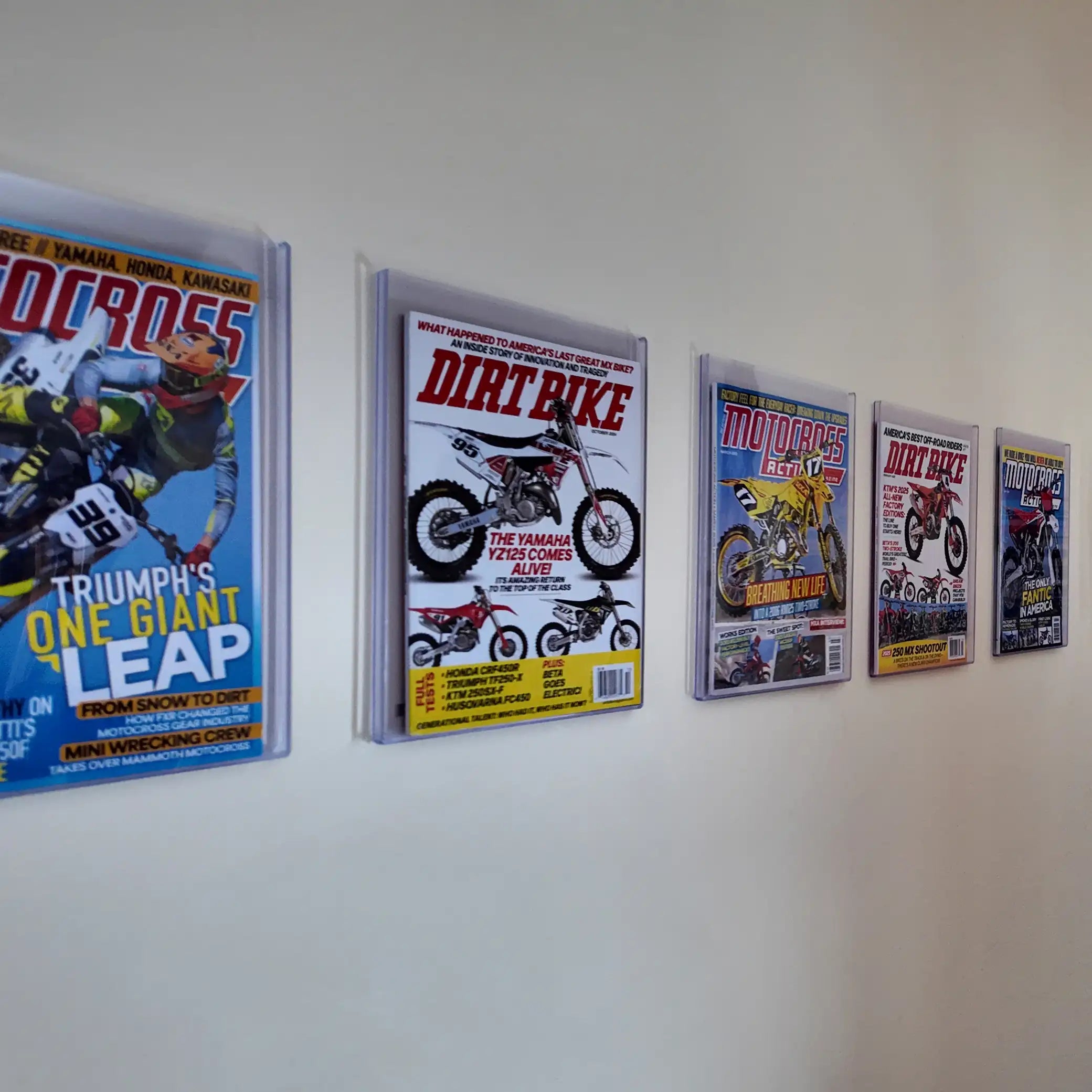 Side view of FlexDeez TopLoader wall frame showcasing a magazine