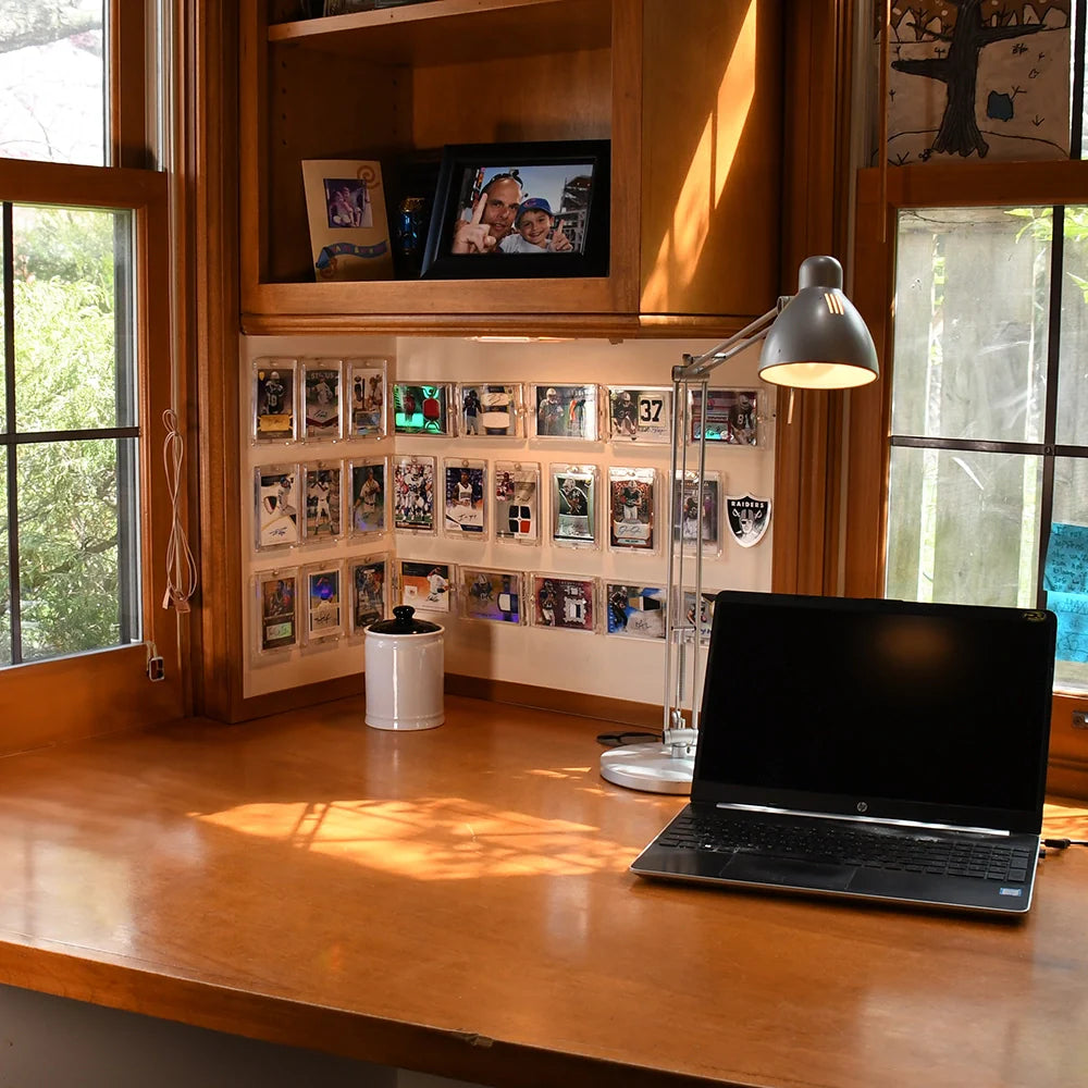 Office corner with FlexDeez wall-mounted card display system